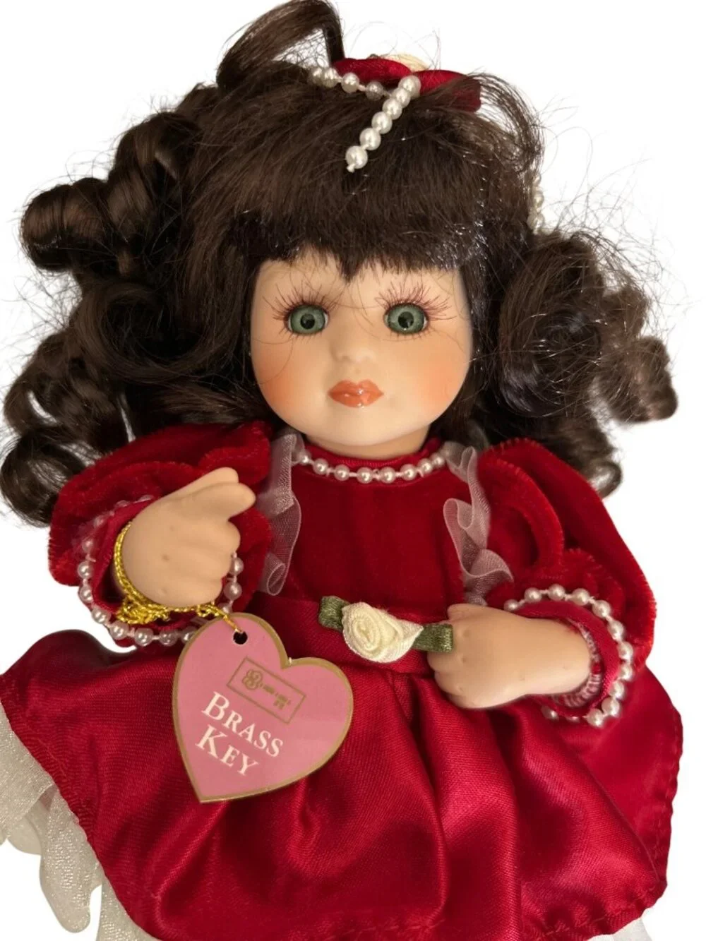 Brass Key Porcelain Doll In Red Dress With Curly Hair Pearl Accents Collectible